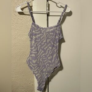 SKIMS Lilac Swirl Bodysuit in size Medium.